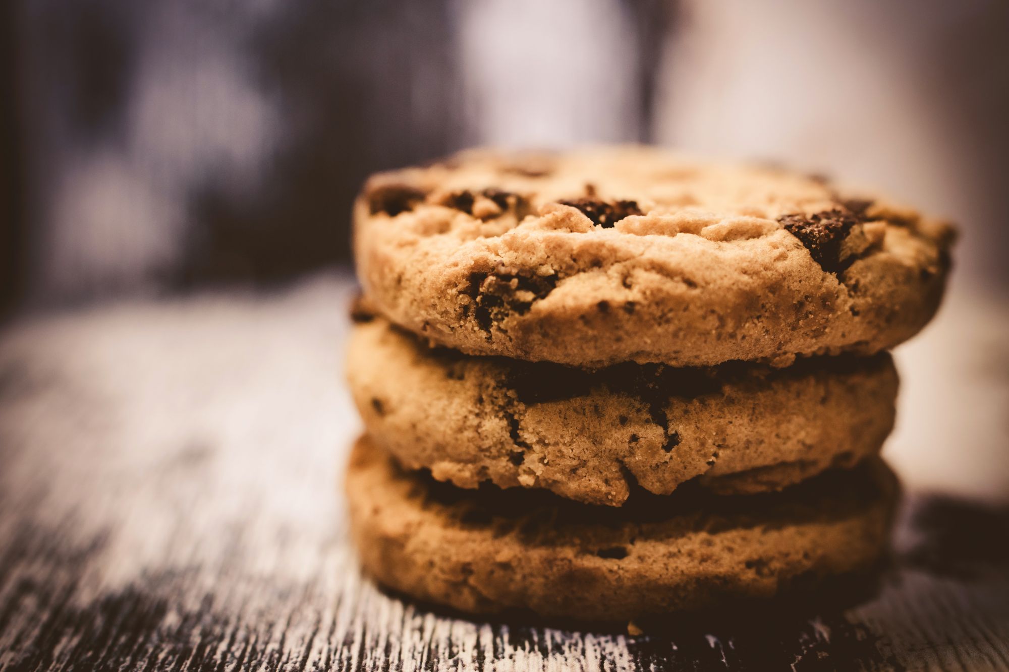 A picture of three cookies stacked on top of each other 